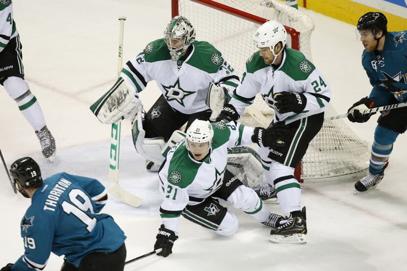 Dec 21, 2013; San Jose, CA, USA; Dallas Stars goalie Kari Lehtonen (32), defenseman Jordie...