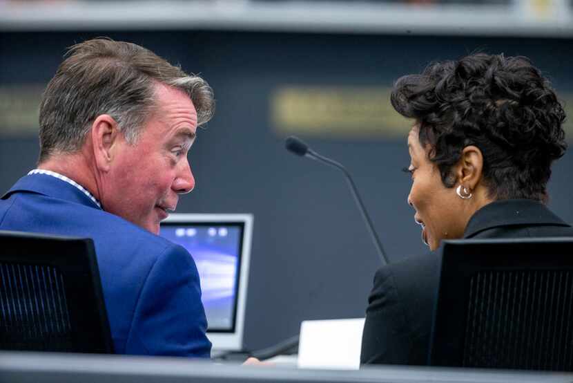Ian McPherson, partner at KPMG, chats with Police Chief U. ReneÃ© Hall before a City Council...