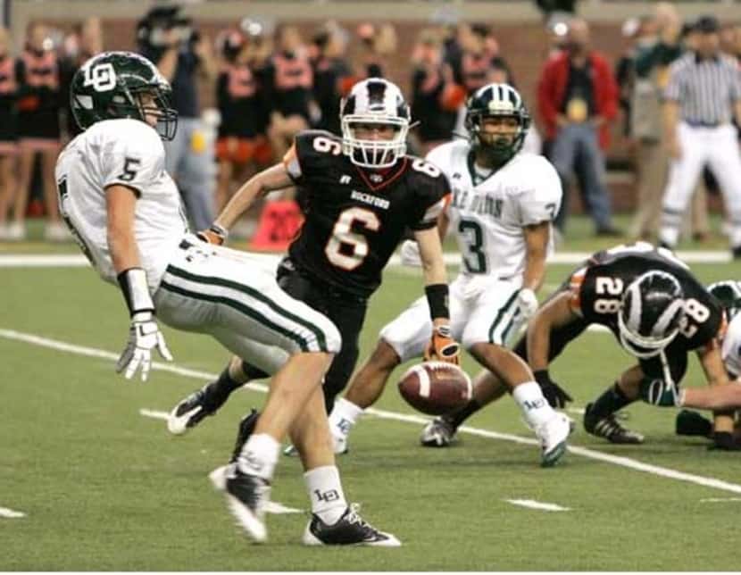 Jeff Heath punts the ball for Lake Orion High School during the 2008 Michigan state...