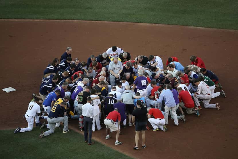 Members of the Republican and Democratic congressional baseball teams gather for a...