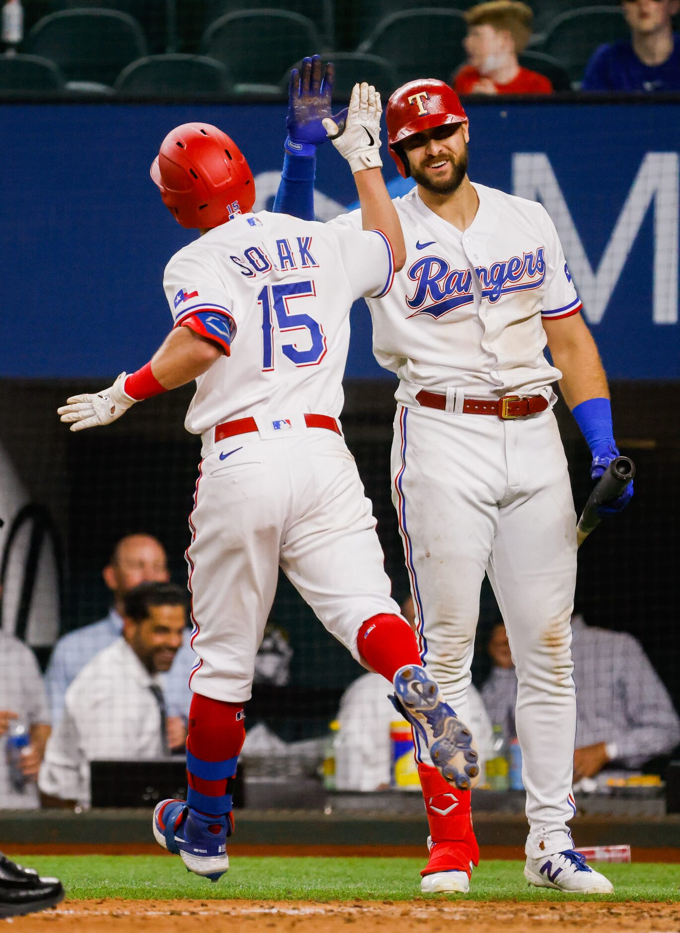 Texas Rangers center fielder Joey Gallo (13) cheers on Texas Rangers second baseman Nick...