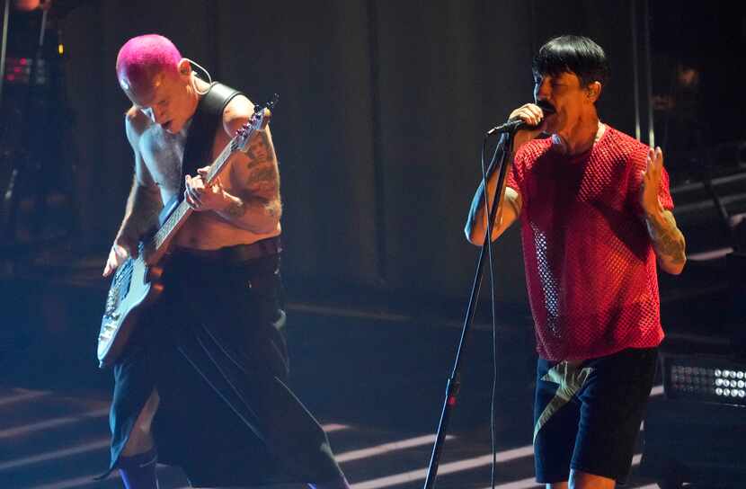Flea, left, and Anthony Kiedis perform at the MTV Video Music Awards at the Prudential...