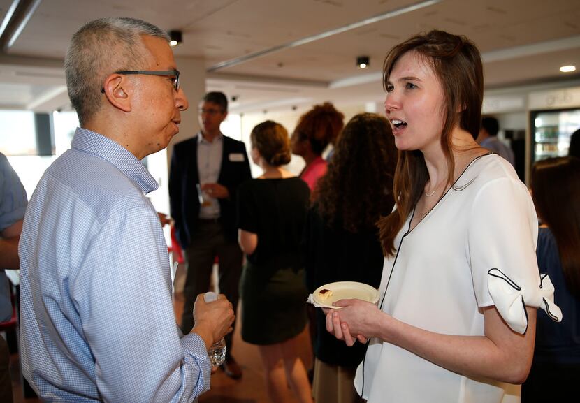 Editorial intern Laura Hallas talks to Thomas Huang, Assistant Managing Editor for Features...