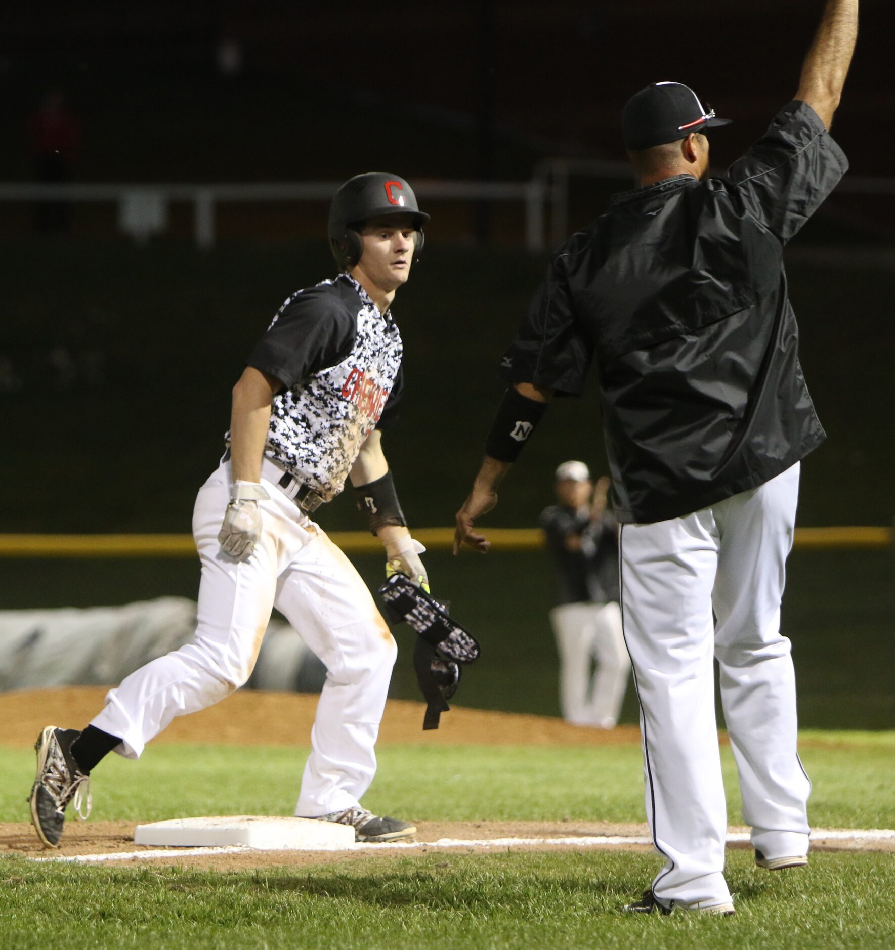 Carrollton Creekview head coach Leroy Mansanales calls for time out after outfielder Dawson...