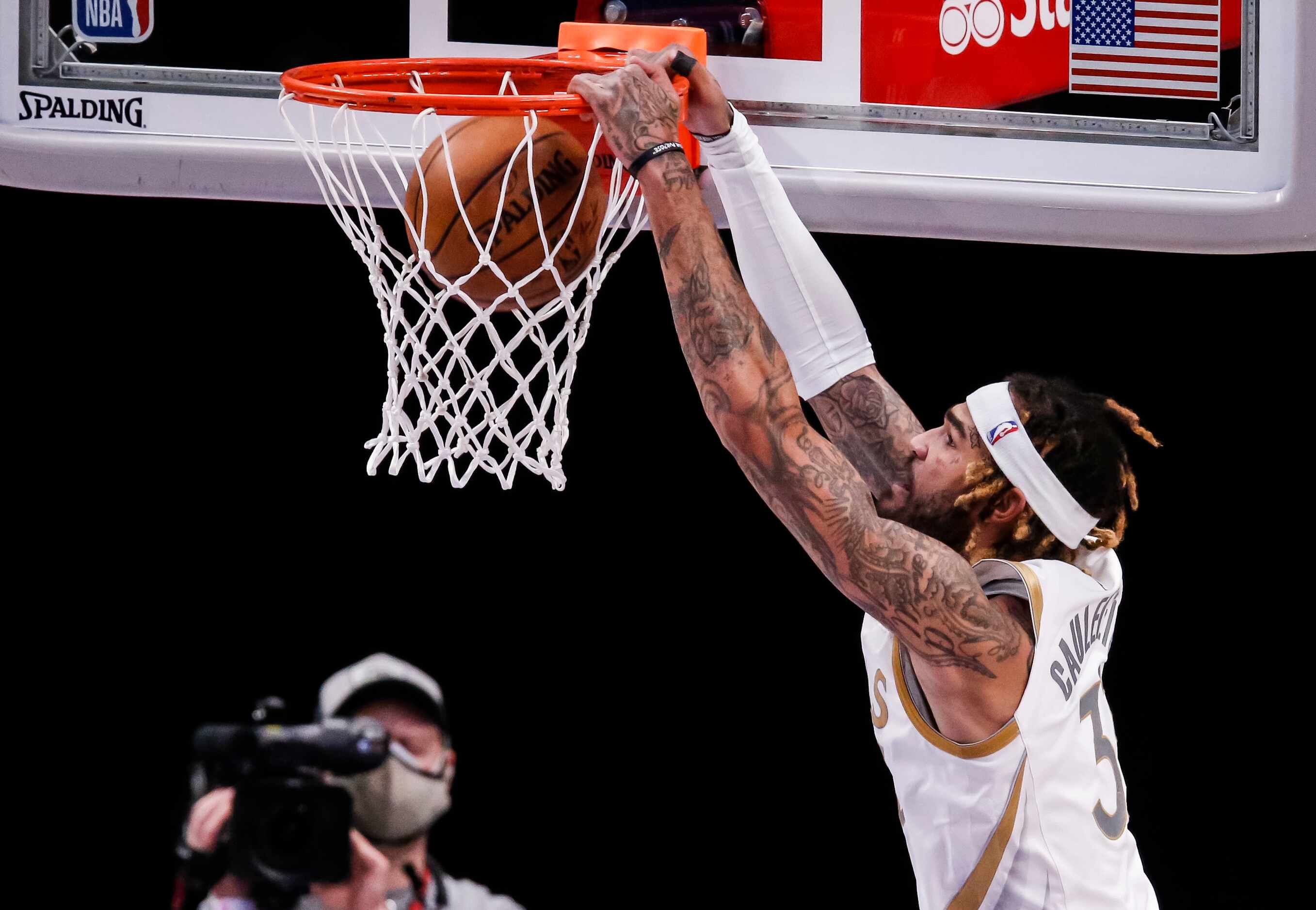 Dallas Mavericks forward Willie Cauley-Stein (33) dunks during an NBA basketball game...