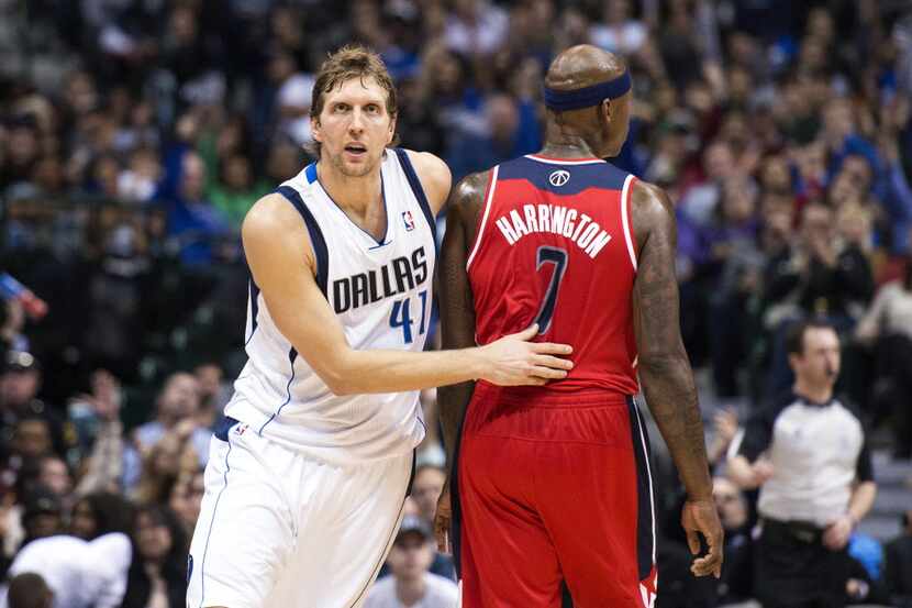 Nov 12, 2013; Dallas, TX, USA; Dallas Mavericks power forward Dirk Nowitzki (41) celebrates...
