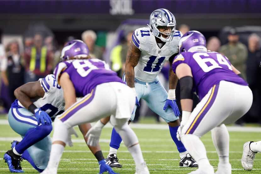 Dallas Cowboys linebacker Micah Parsons (11) lines up against the Minnesota Vikings defense...