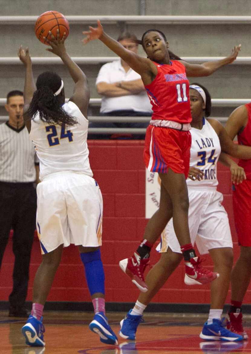 Duncanville guard Chrineisha Davis (11) flies in defense of Garland Lakeview Centennial...