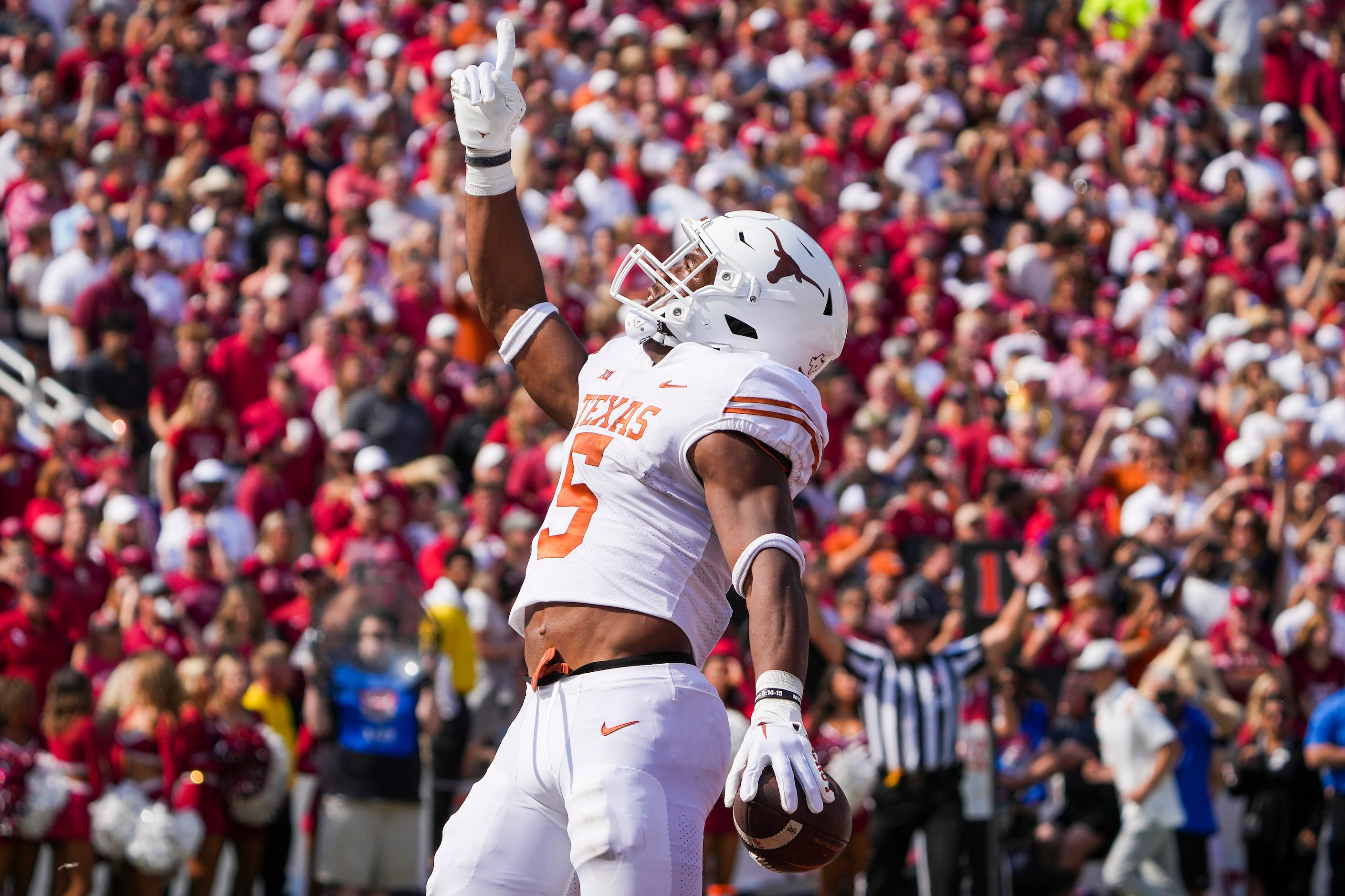 Texas running back Bijan Robinson (5) celebrates after scoring on a touchdown run during the...