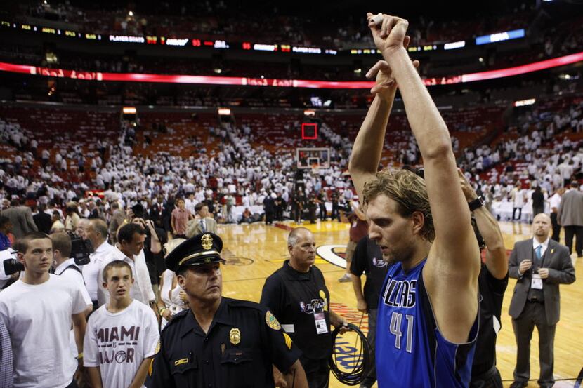 Dallas Mavericks power forward Dirk Nowitzki (41) leaves the court after they defeated the...