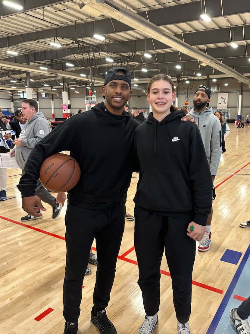 Finley Chastain met NBA All-Star Chris Paul (left) at the Tournament of Champions in Phoenix...