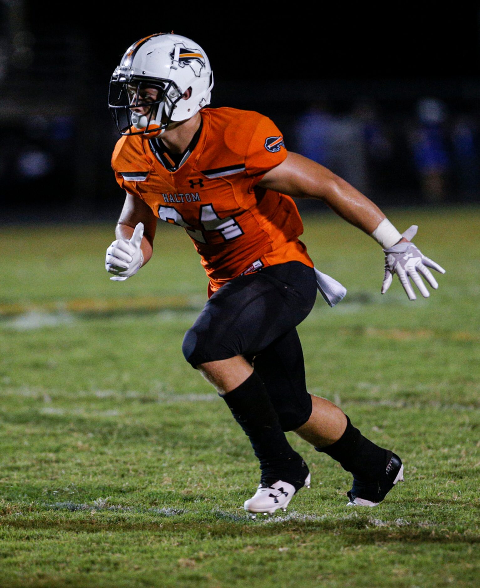 TXHSFB Haltom City senior linebacker Gavon Lange (24) defends during the first half of a...