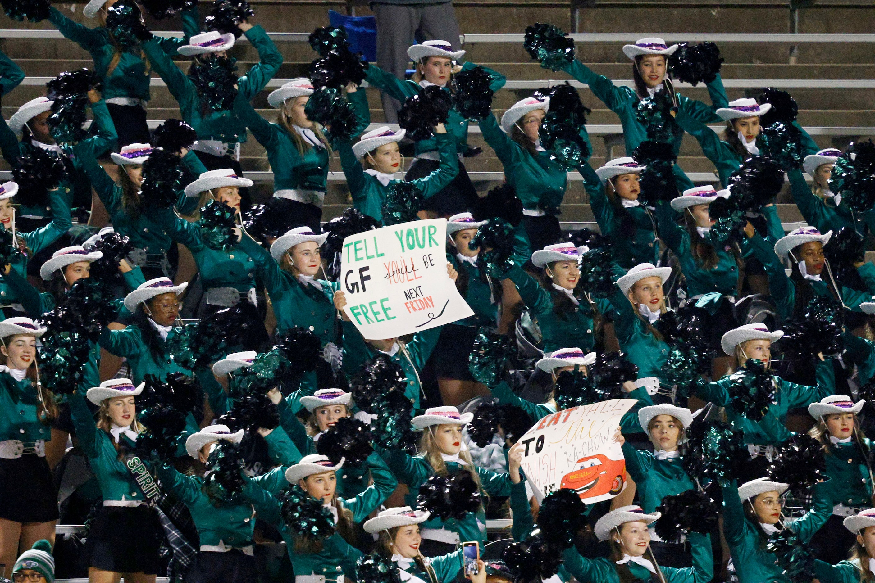 Prosper dance team members perform before a high school football game against Coppell at...