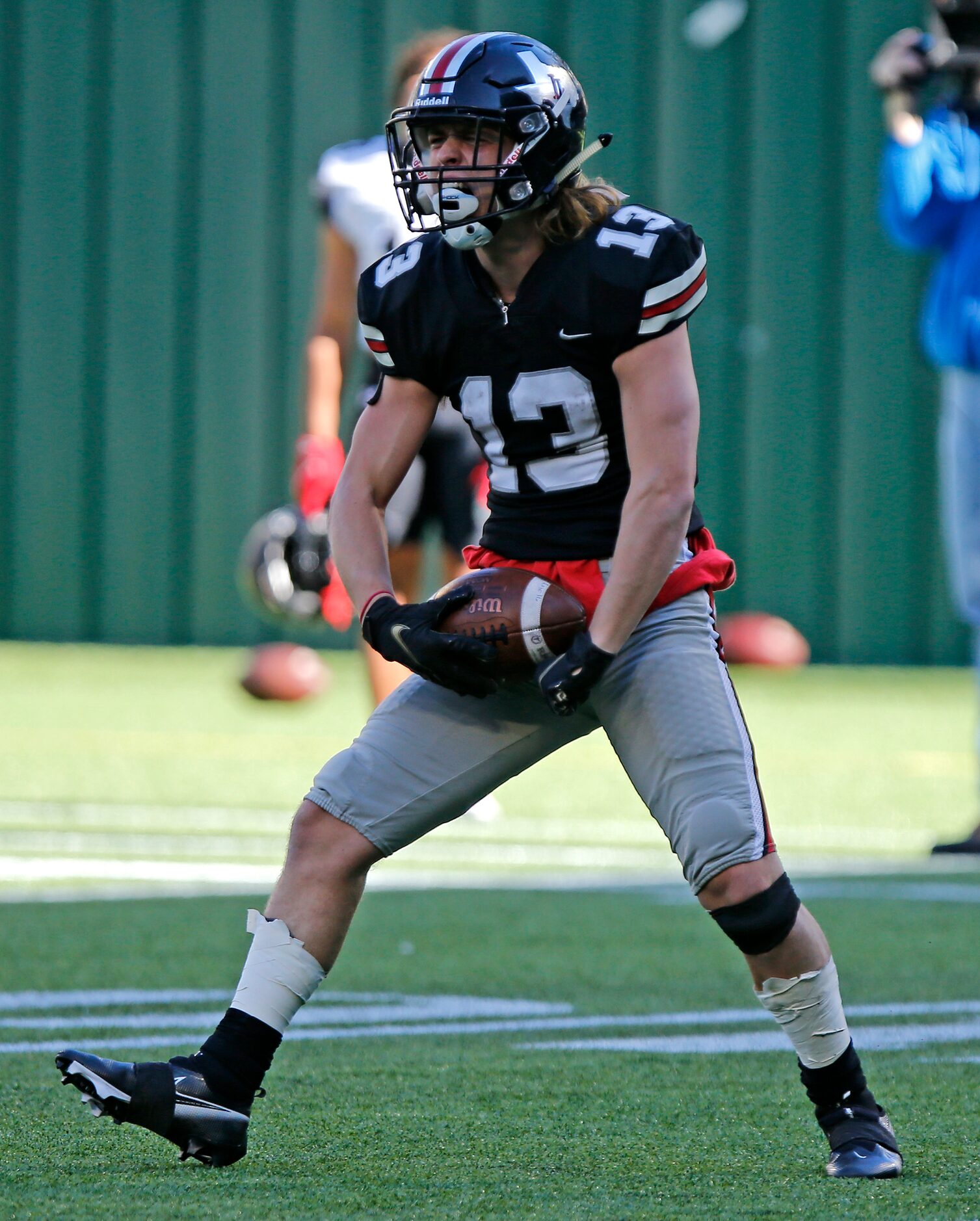 Lovejoy High School wide receiver Luke Mayfield (13) celebrates a catch which would set up...