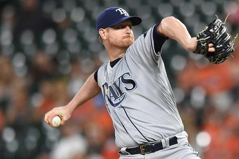 FILE - Tampa Bay Rays right-hander Alex Cobb pitches against the Baltimore Orioles in the...