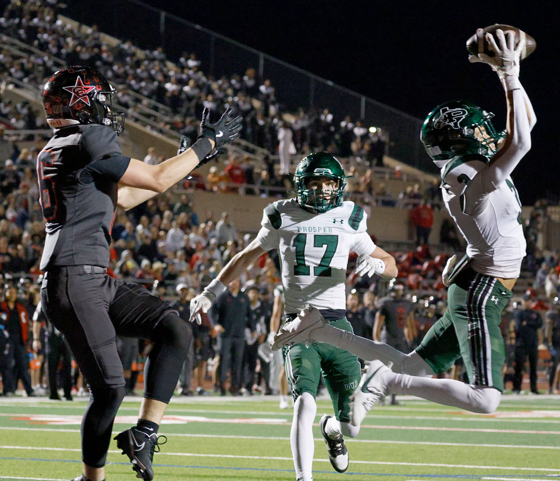 Prosper's Blake Summers (3), right, intercepts a pass intended for Coppell's Ethan Schuy...