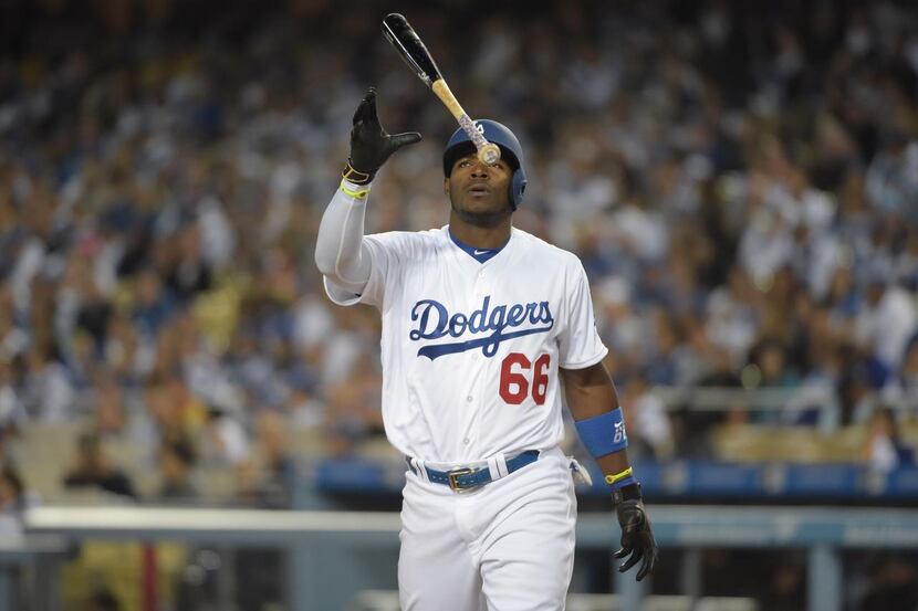 
Los Angeles Dodgers right fielder Yasiel Puig defected from Cuba with the help of...
