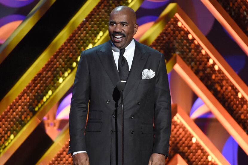 Steve Harvey presents an award at the 42nd annual Daytime Emmy Awards in Burbank, Calif., in...