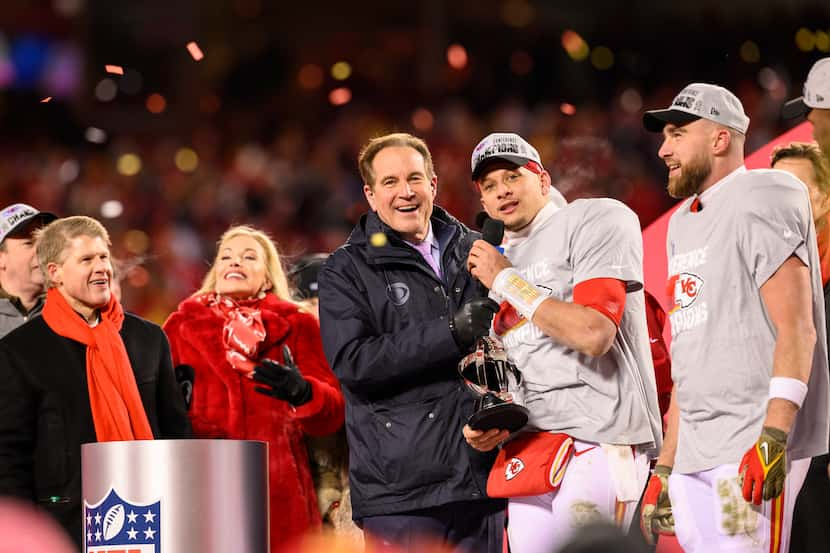 Kansas City Chiefs quarterback Patrick Mahomes speaks to the crowd while being interviewed...