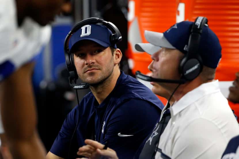 FILE - In this Oct. 30, 2016, file photo, Dallas Cowboys quarterback Tony Romo talks with...