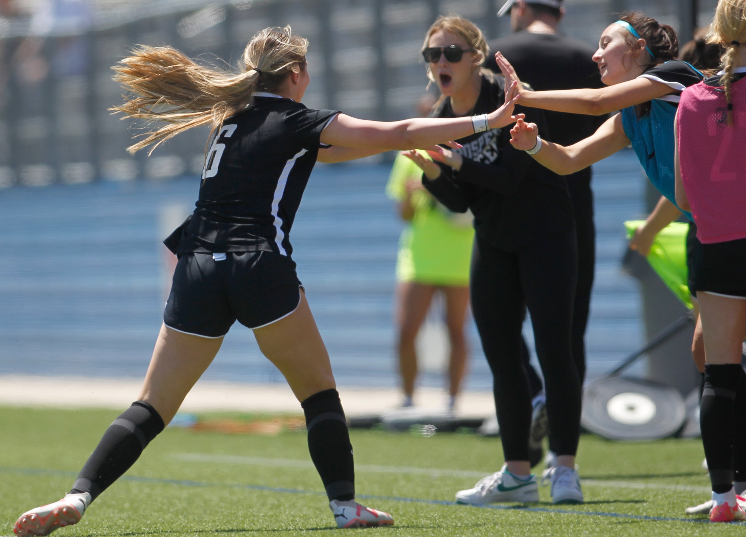  Prosper forward Ava Germany (6), left, is congratulated along the team bench area after her...