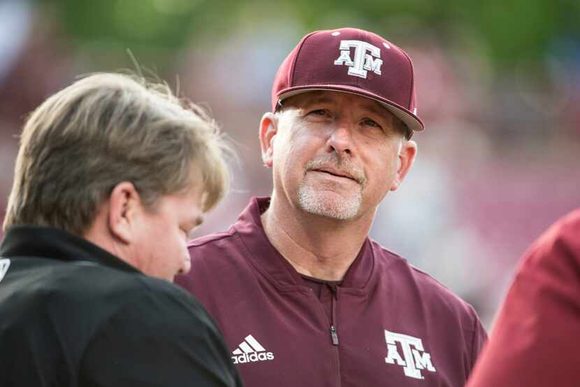 Texas A&M head coach Rob Childress listens during the plate meeting before an NCAA college...