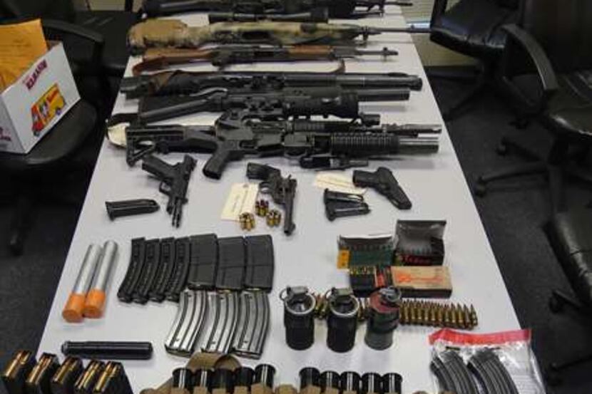 Police reported finding a number of weapons and accessories.