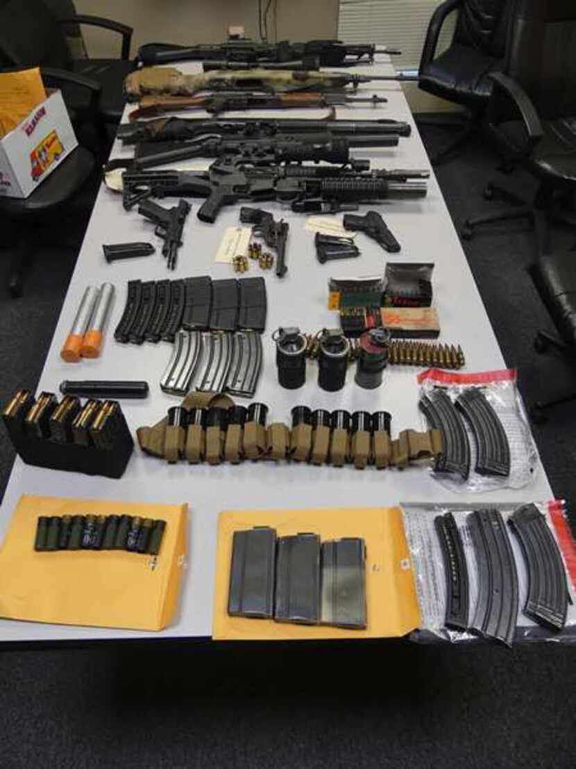Police reported finding a number of weapons and accessories.