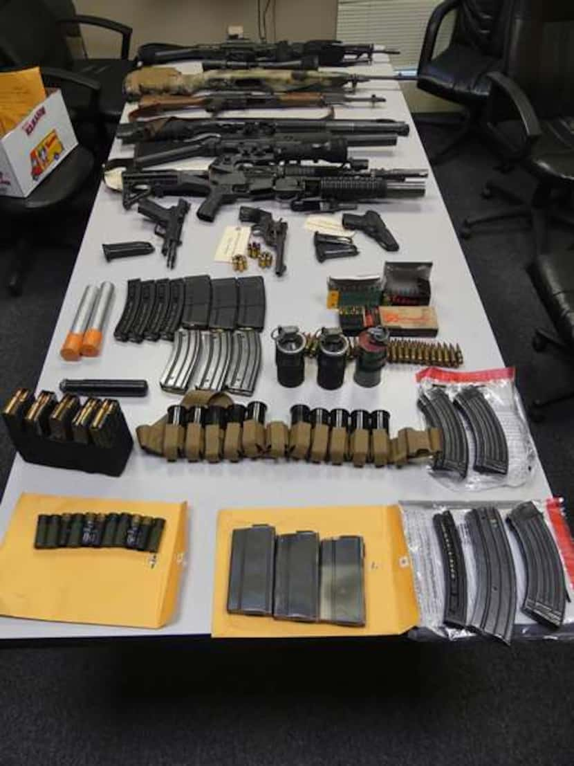 Police reported finding a number of weapons and accessories.