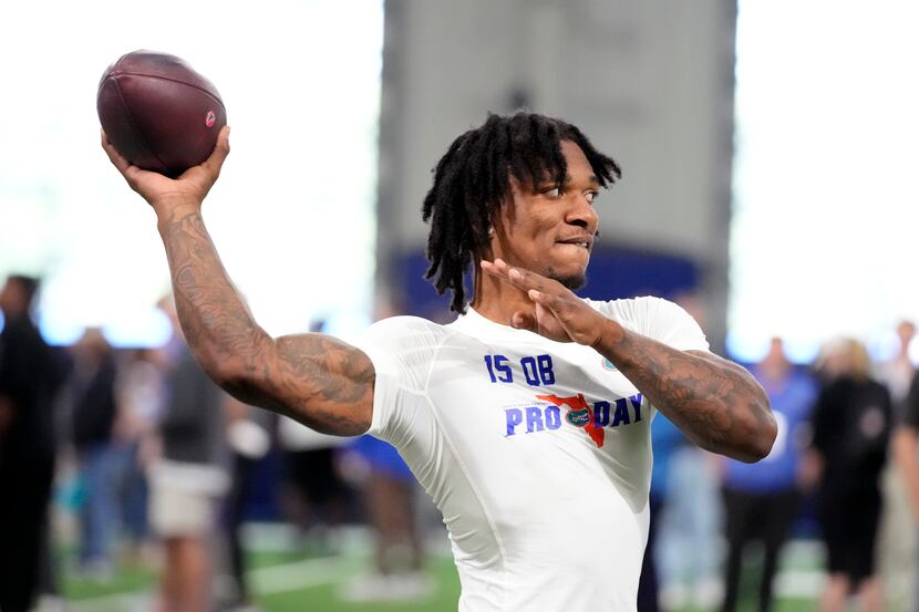 Florida quarterback Anthony Richardson throws a pass during an NFL football Pro Day,...