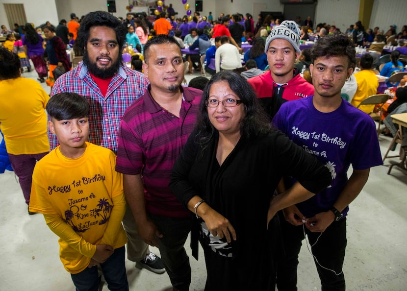 From left, JR Robinson, 12, Augustine Langmos, 18, Cornelius Langmos, Rosemina Langmos,...