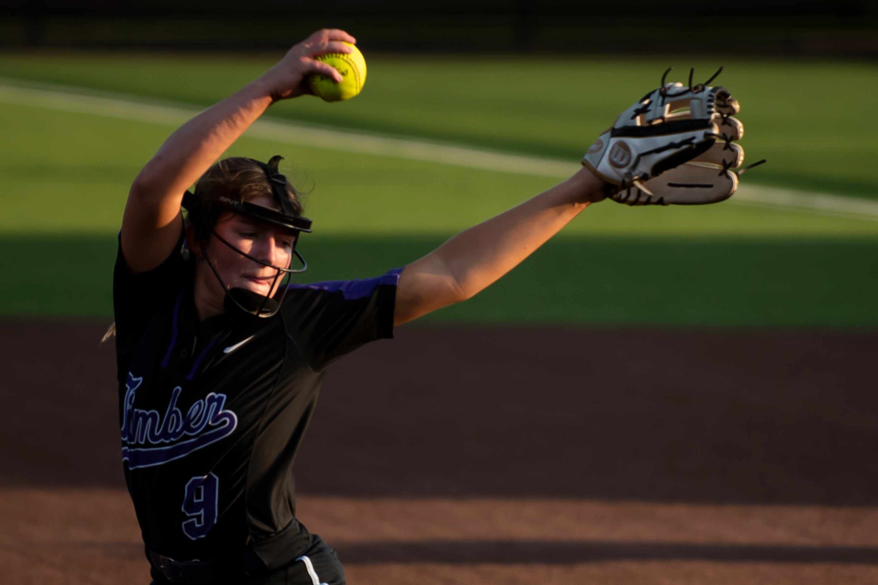 Timber Creek senior Nicole Stuhr (9) delivers a pitch during Game One of the Class 6A...