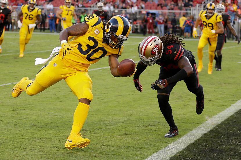 Los Angeles Rams running back Todd Gurley (30) scores a touchdown in front of San Francisco...