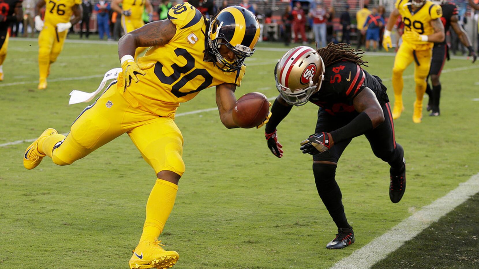 Los Angeles Rams running back Todd Gurley (30) scores a touchdown in front of San Francisco...