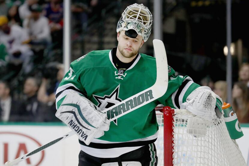 DALLAS, TX - MARCH 12:  Antti Niemi #31 of the Dallas Stars reacts after giving up a goal...