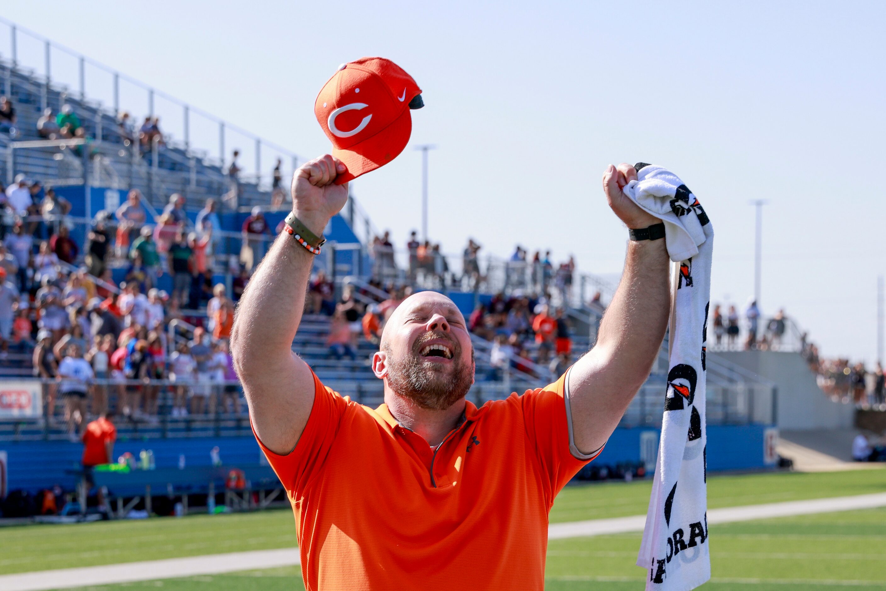 Celina head coach Alexander Adams reacts after winning the Class 4A girls soccer state...