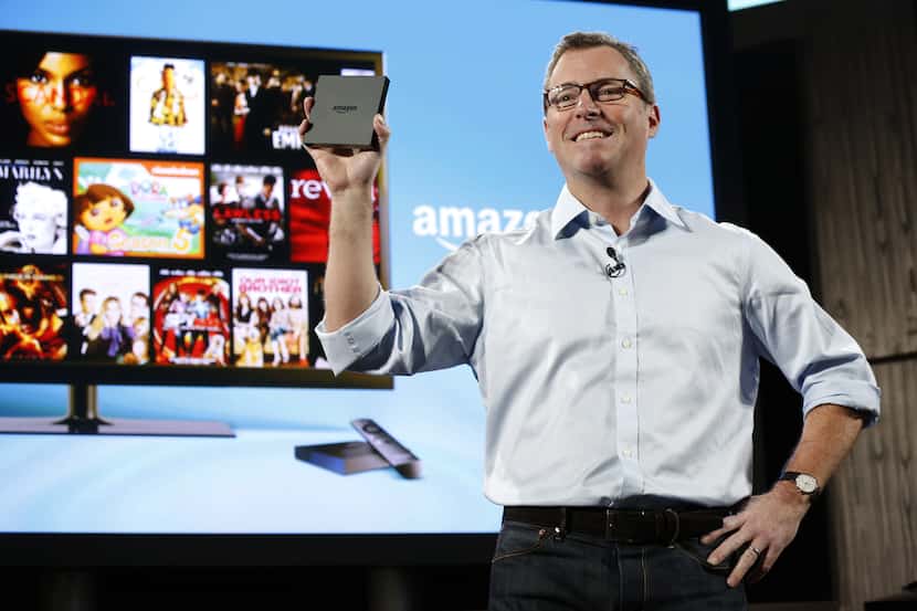 Peter Larsen, vice president of Amazon Inc., introduces Amazon FireTV during a news...