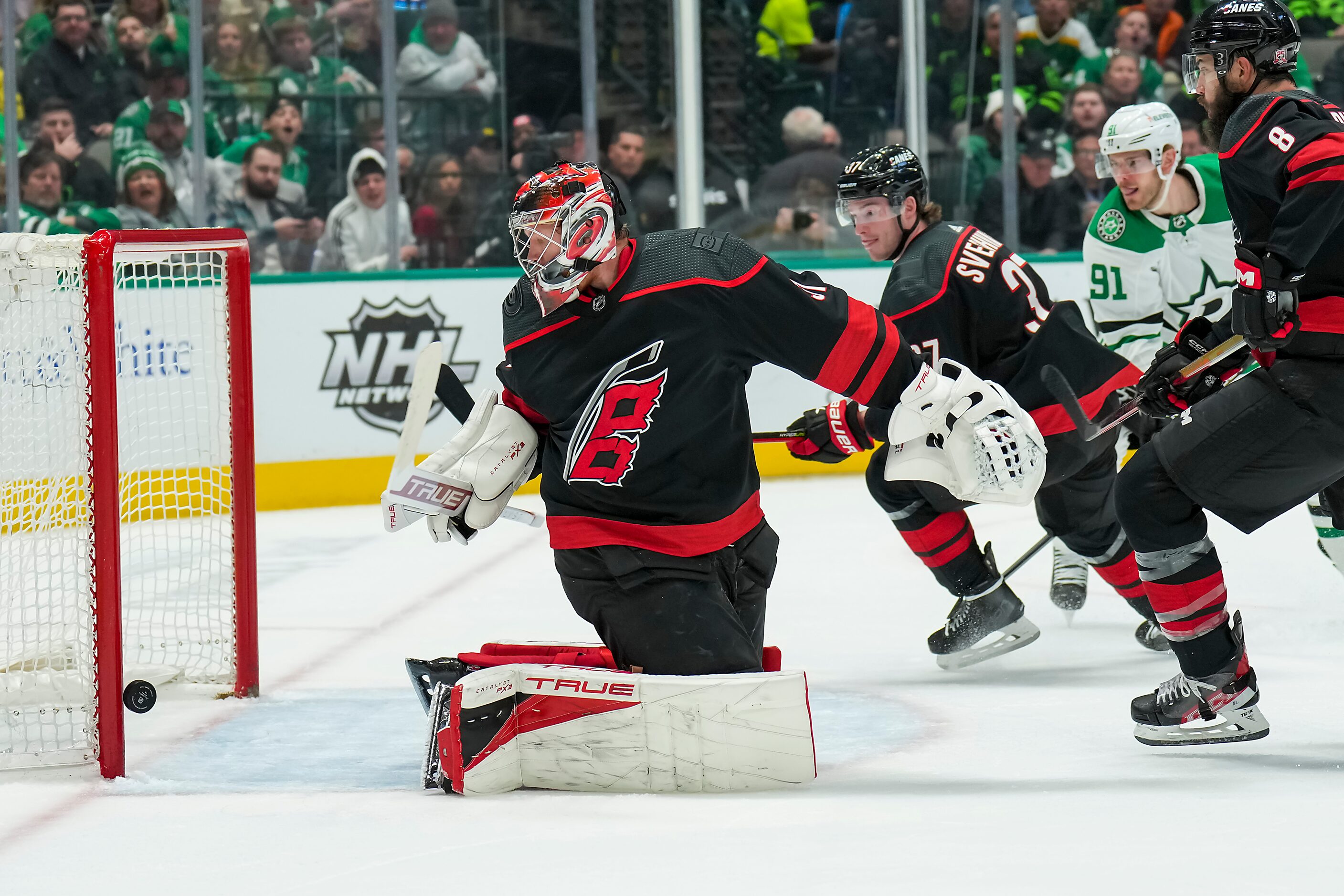 Carolina Hurricanes goaltender Frederik Andersen (31) turns away a shot by Dallas Stars...