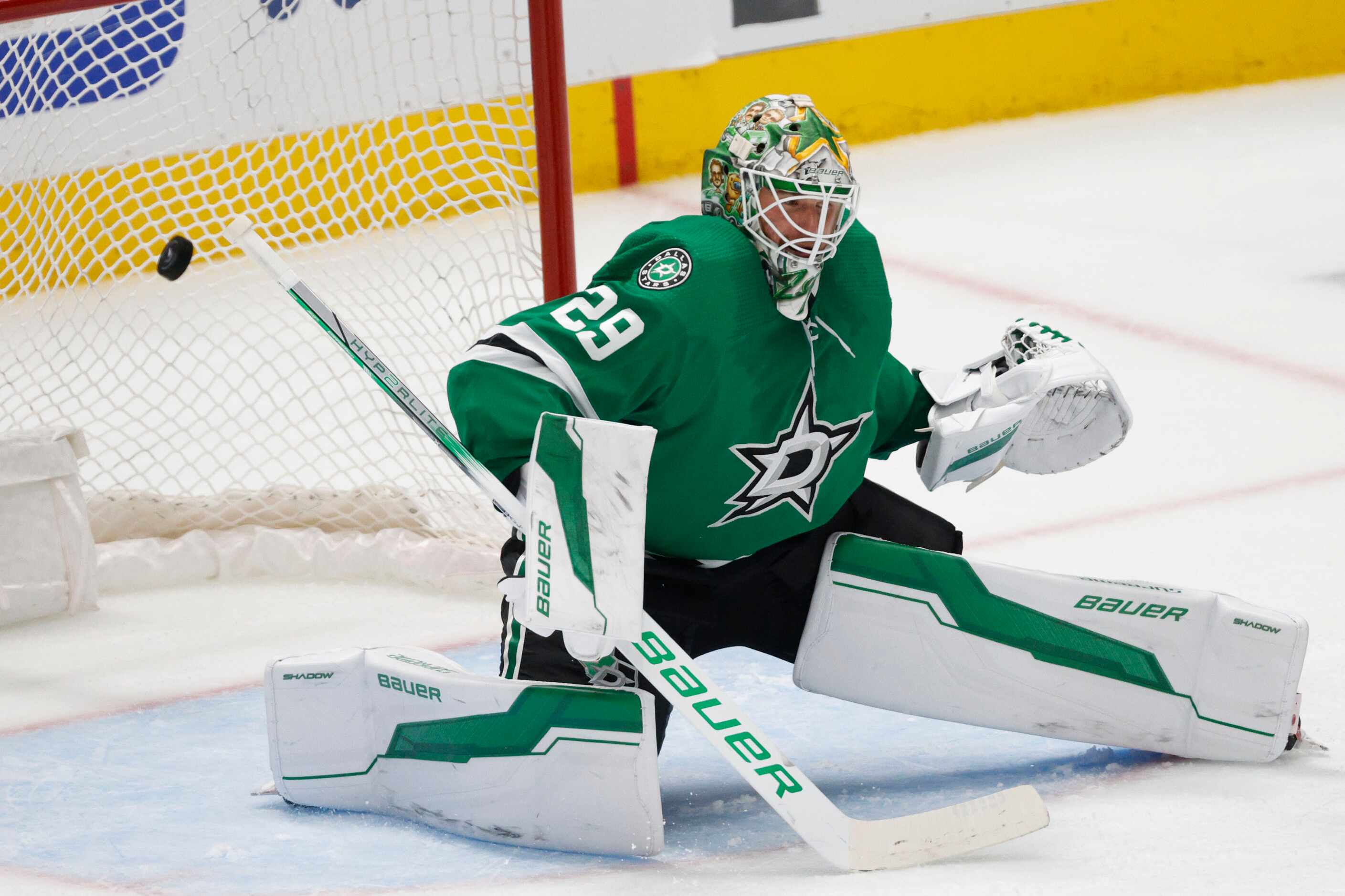 Dallas Stars goaltender Jake Oettinger (29) cannot stop a shot by Colorado Avalanche...