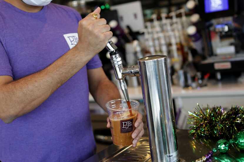 Ridham Bhatt pours a coffee at PJ's in McKinney. The New Orleans-based company plans to...