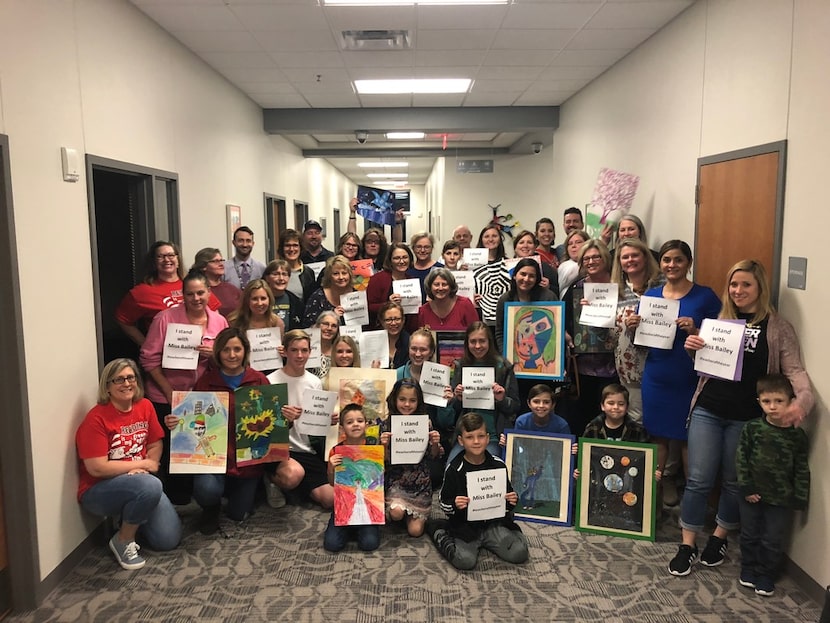 Approximately 40 parents and students showed up at a Mansfield ISD board meeting to speak in...