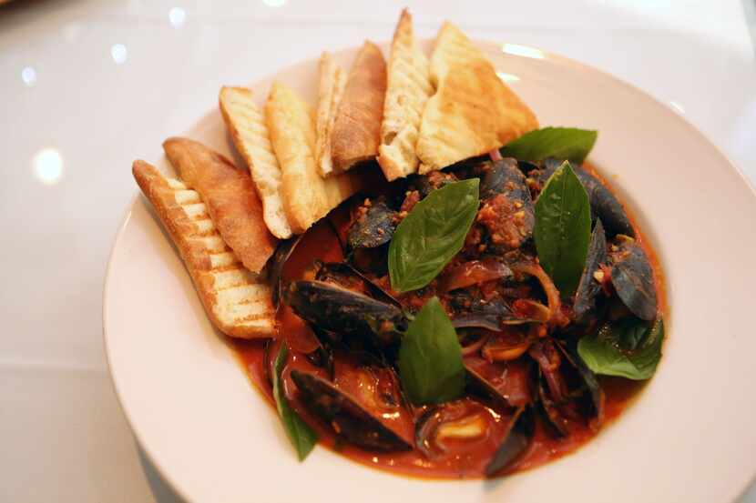 Steamed mussels at Urbano Cafe in East Dallas, which will serve its last customers Jan. 27,...