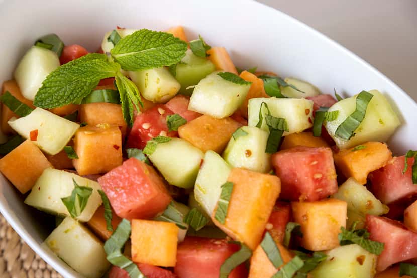 Spicy Melon Salad can be tossed with either mint or basil for a fresh finish to a summer meal.
