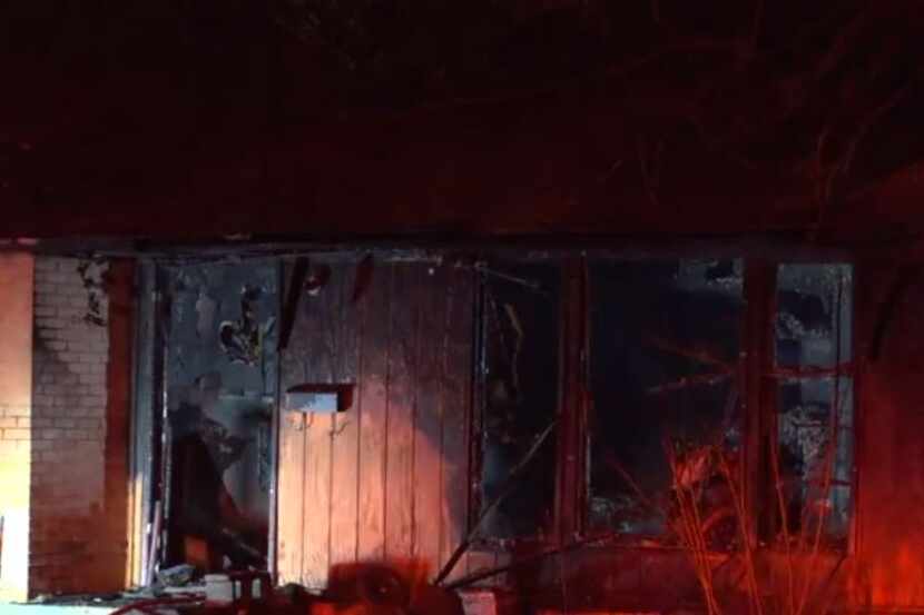 The front of a home in central Oak Cliff shows heavy damage after a fire broke out just...