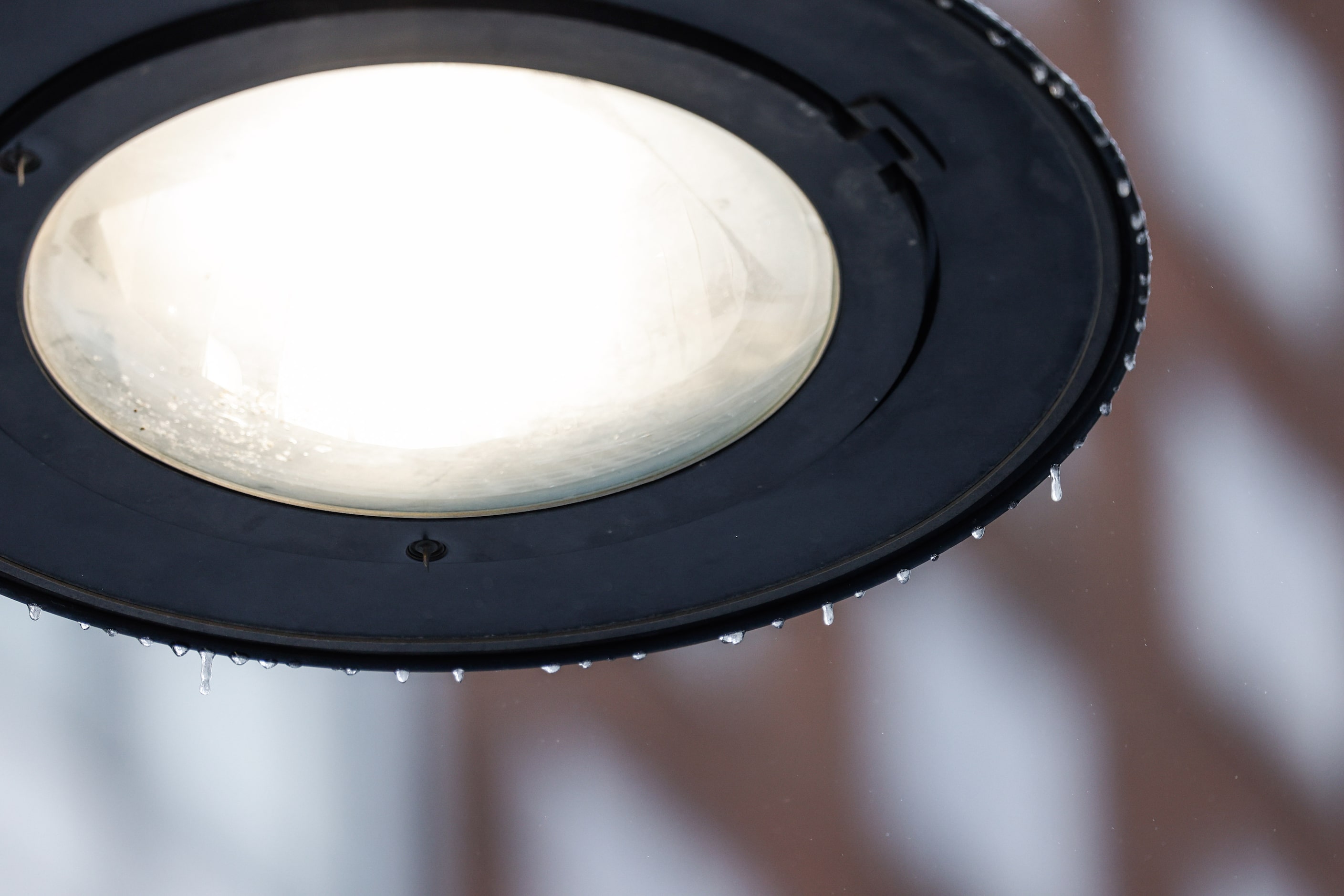 A street lamp with frozen rain as sleet covered downtown Dallas on Tuesday, Jan. 31, 2023....