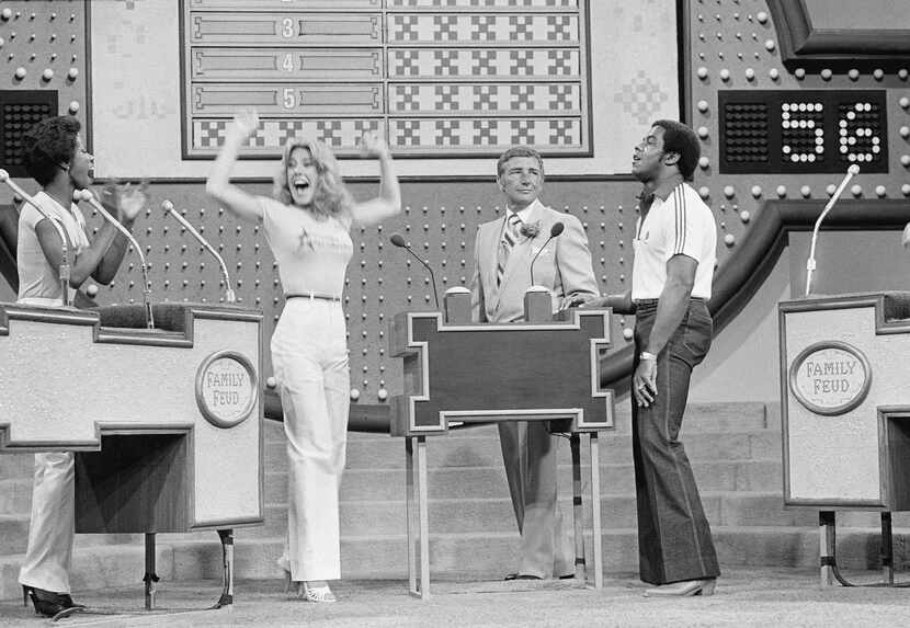 In this June 25, 1980 file photo, host Richard Dawson, center, watches while Dallas Cowboys...
