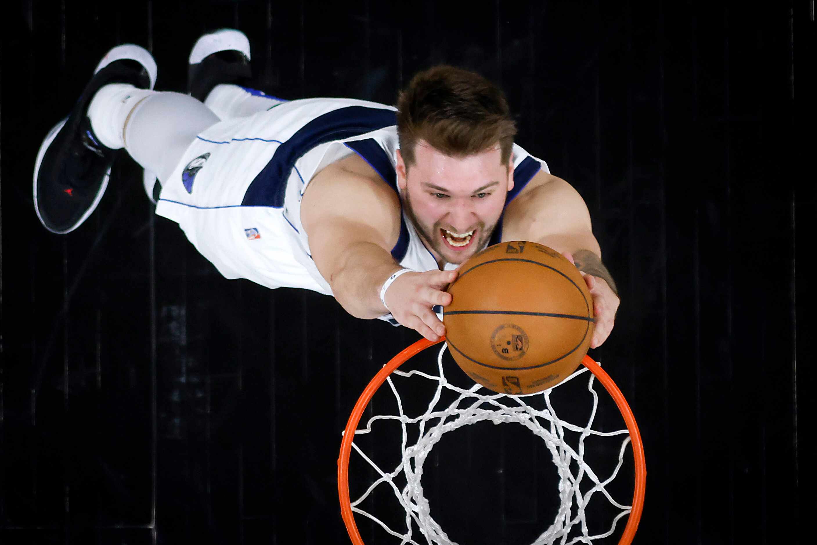 Dallas Mavericks guard Luka Doncic goes up for a dunk during Game 1 of an NBA second round...