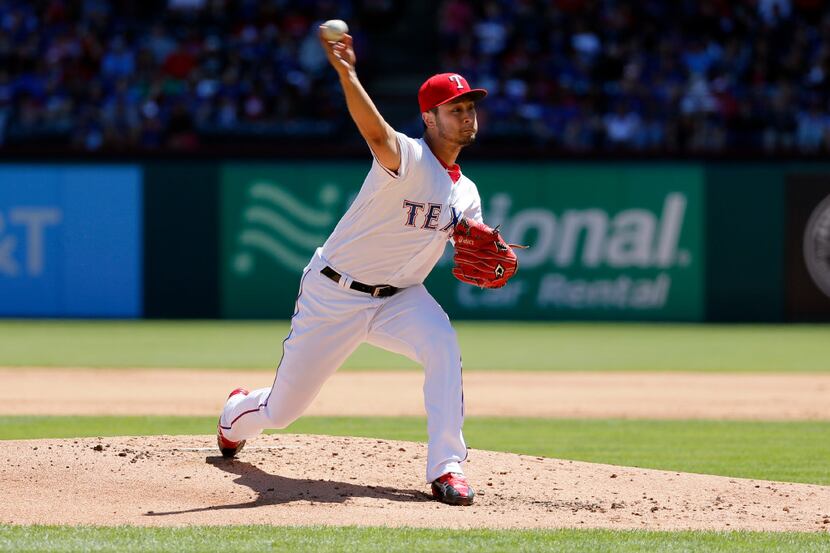 Texas Rangers starting pitcher Yu Darvish (11) of Japan throws to the Kansas City Royals in...