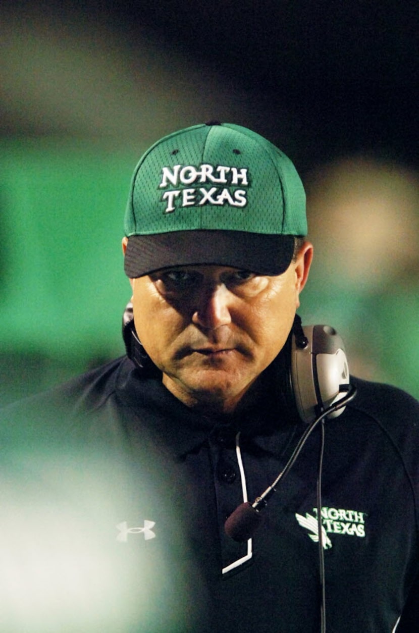 University of North Texas football head coach Todd Dodge on the sidelines after speaking to...