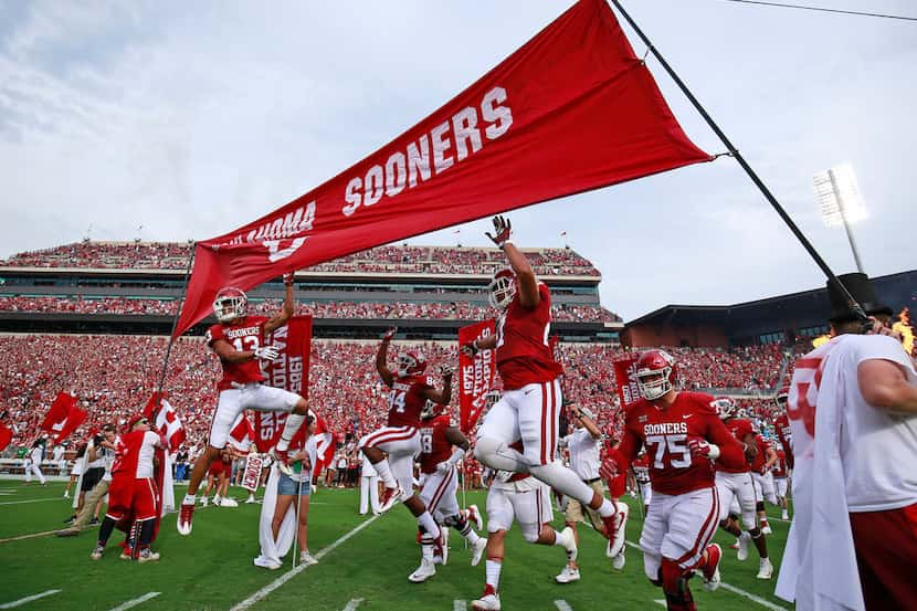 NORMAN, OK - SEPTEMBER 16: The Oklahoma Sooners take the field before the game against the...